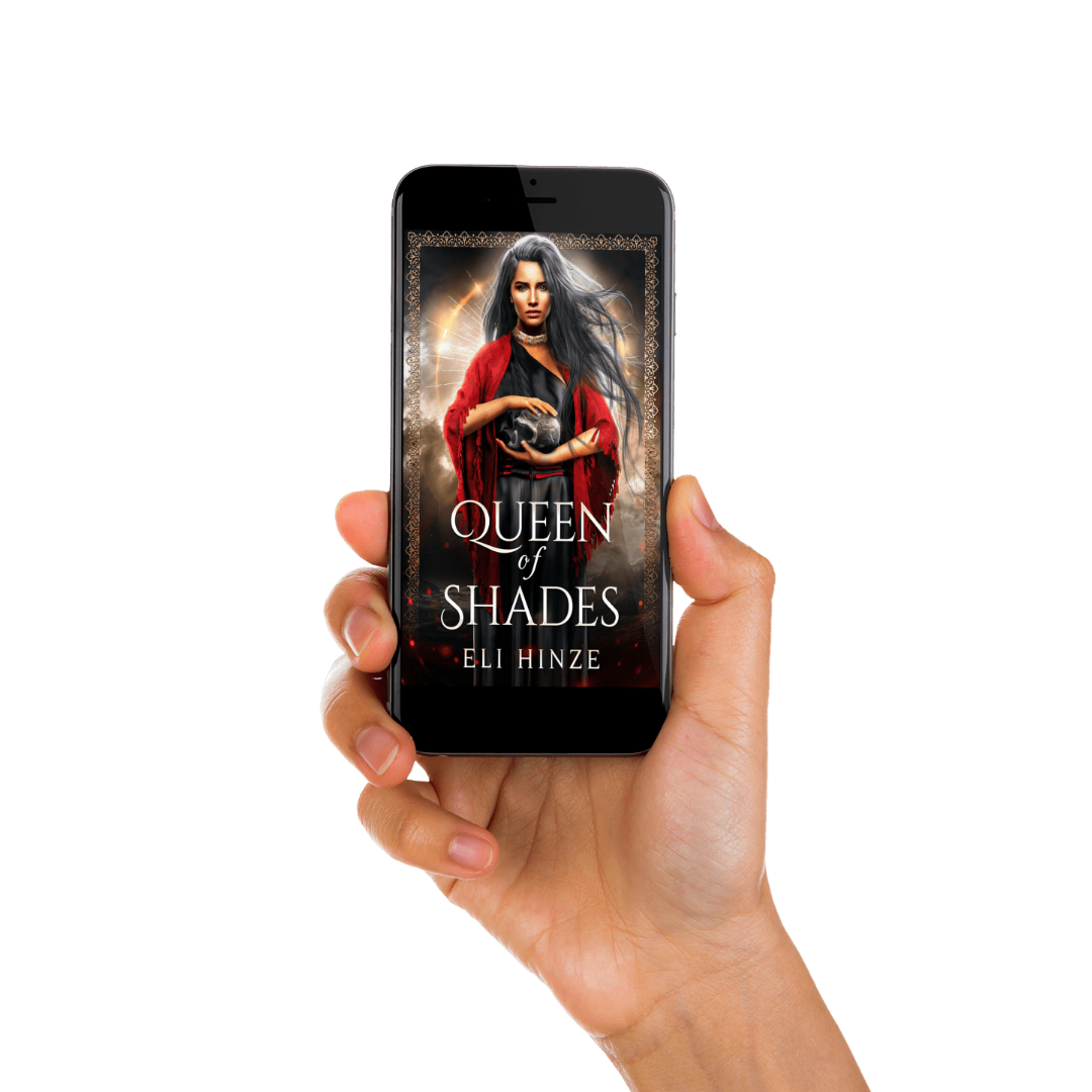 A hand holding a phone displaying the ancient fantasy ebook Queen of Shades by Eli Hinze