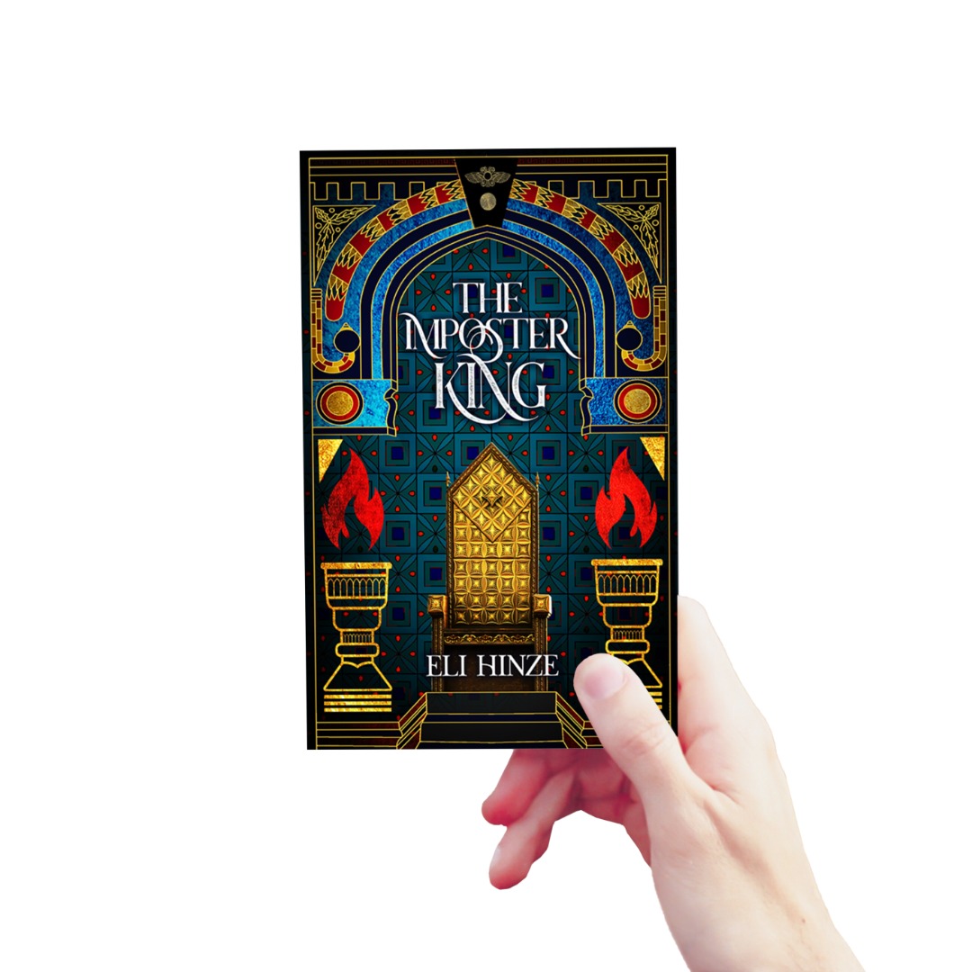 A hand holding up a paperback of the ancient fantasy book The Imposter King by Eli Hinze