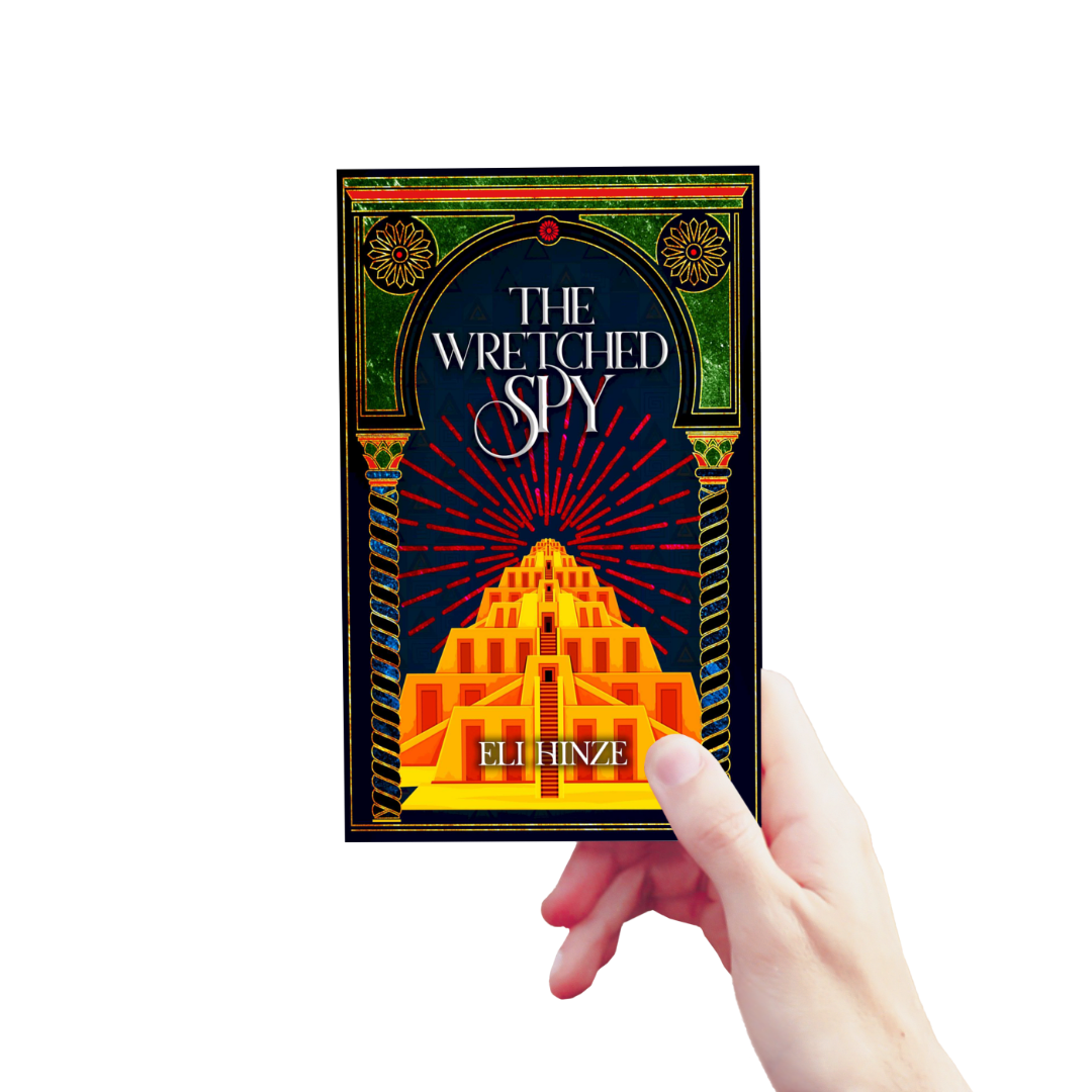 A hand holding up a paperback of the ancient fantasy book The Wretched Spy by Eli Hinze